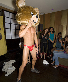 Hot brunette sucks a large cock from Dancing Bear